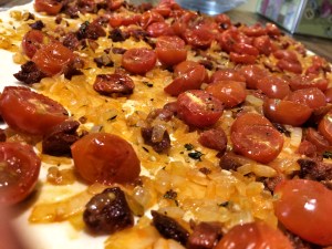 Tear and share bread with chorizo, onion and roast tomatoes