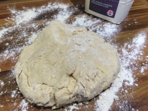 Tear and share bread with chorizo, onion and roast tomatoes