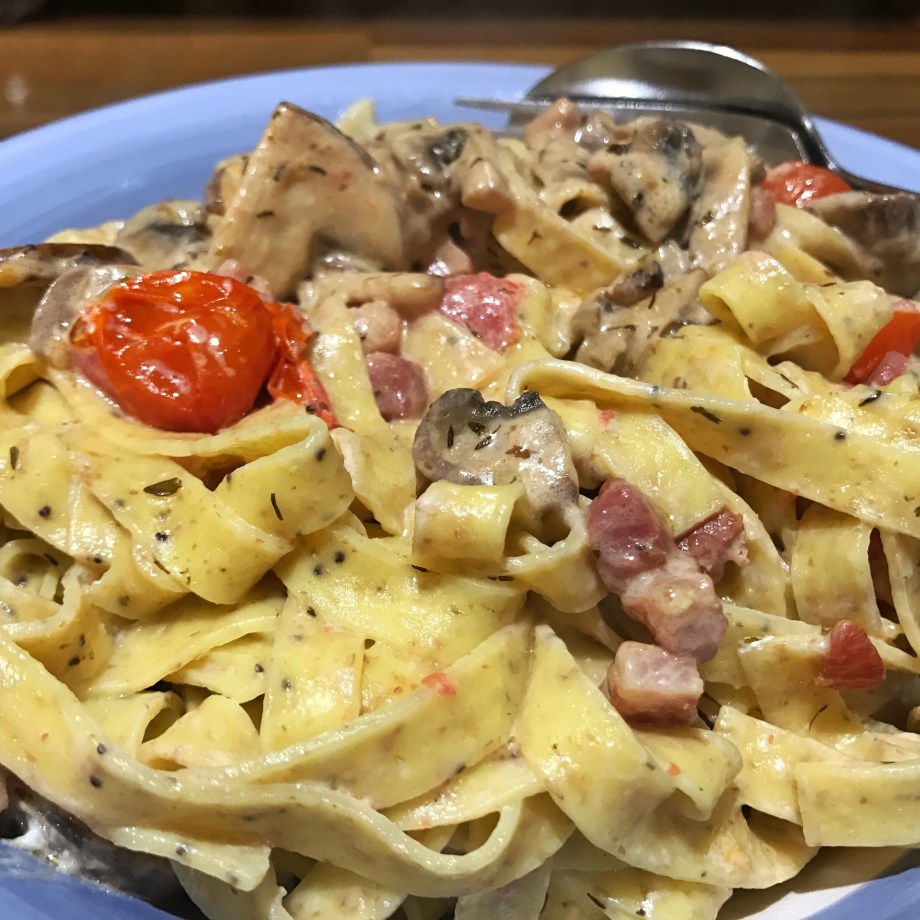 Multigrain tagliatelle with pancetta, mushrooms and cherry tomatoes