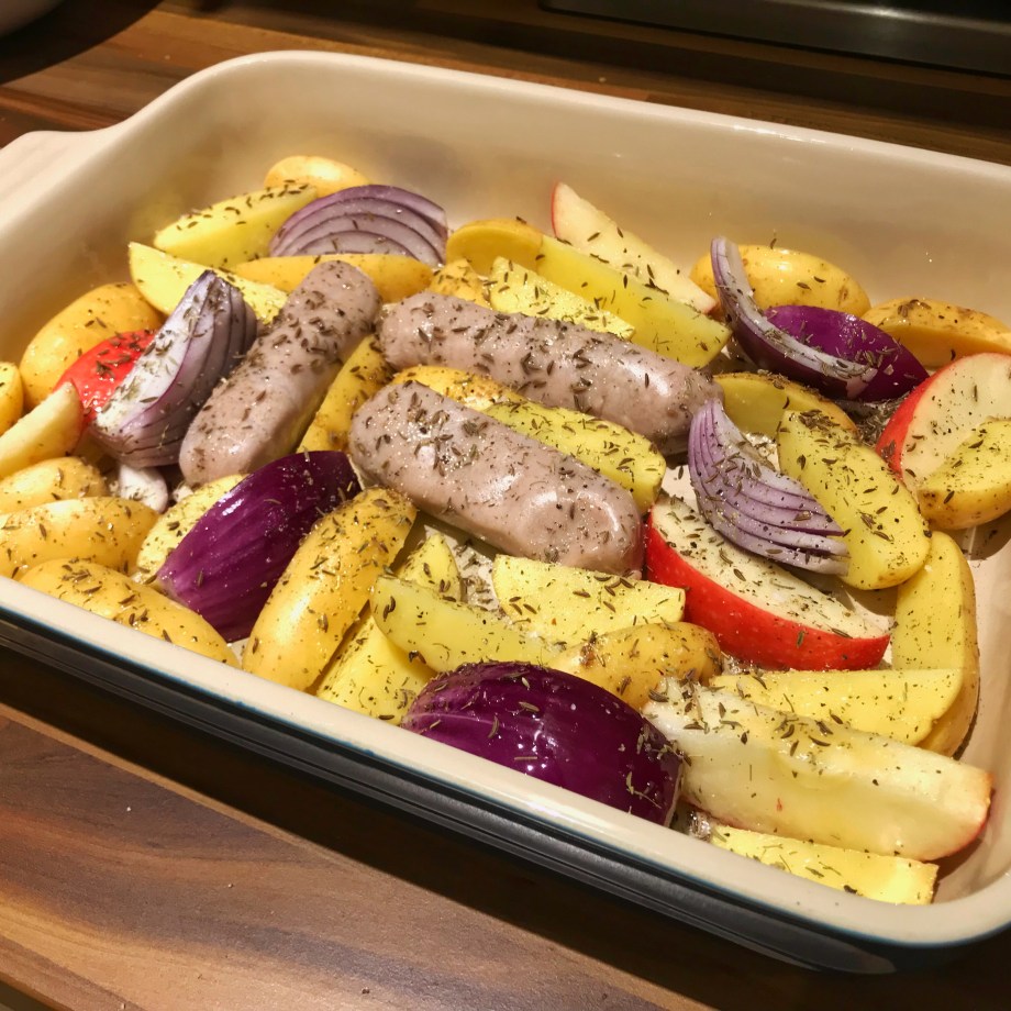 Sausage, apple and red onion tray bake with Vivaldi potatoes